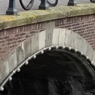 Bridge 38: The Unnamed Arch at the Heart of Amsterdam’s Most Photographed Canal Junction